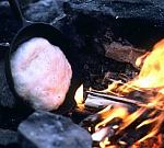 Cooking Bannock on an open fire